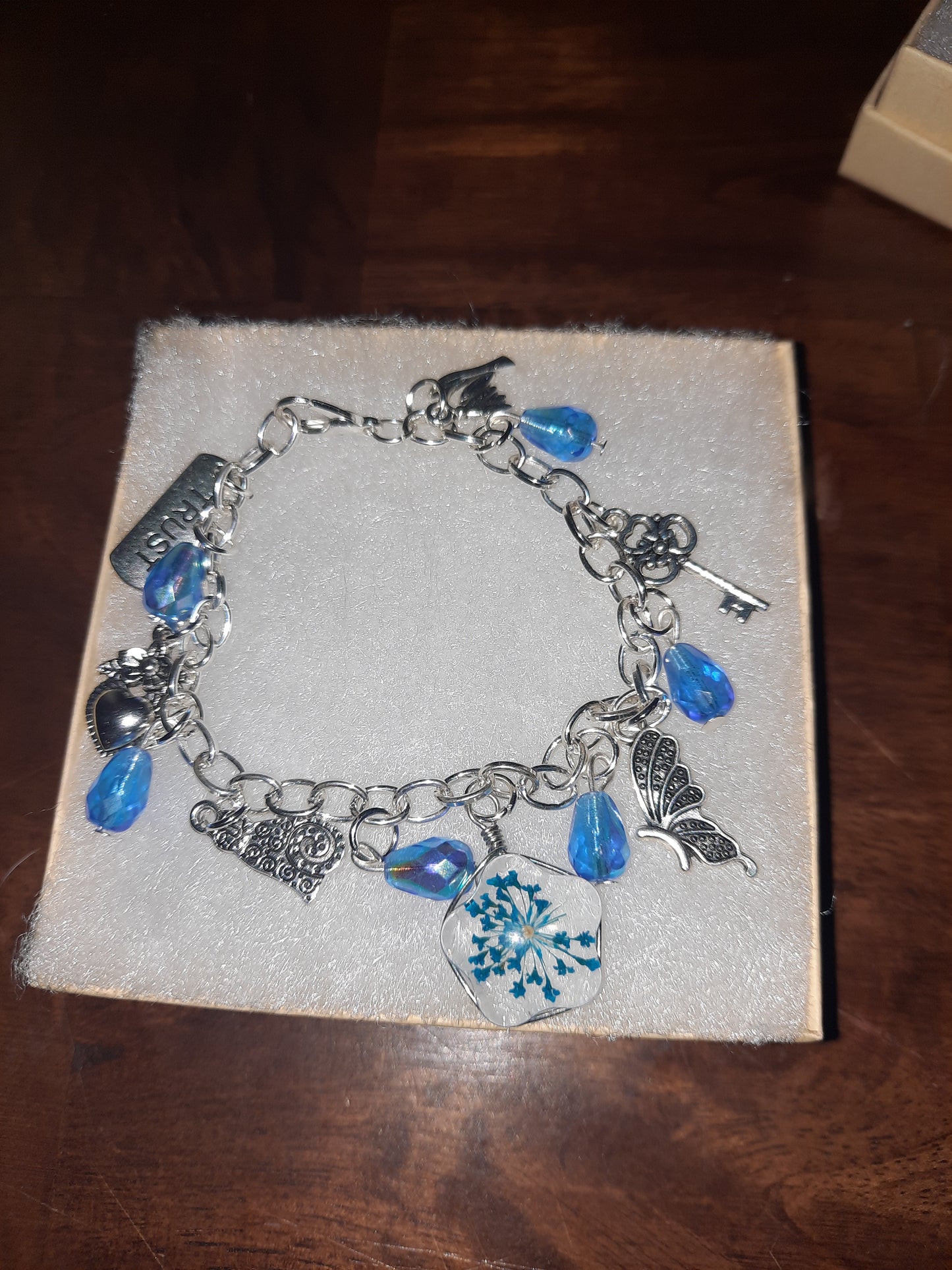 Blue Flower Trust Charm Bracelet